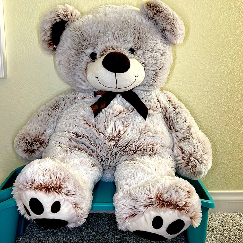 Large Teddy Bear with Brown Bow